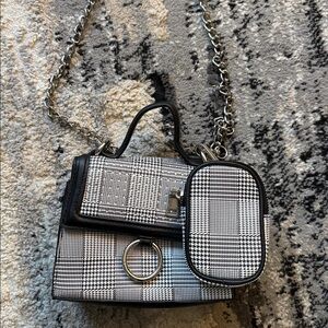 Chic Black and White Handbag with Chain Strap